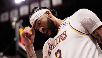 Apr 20, 2024; Denver, Colorado, USA; Los Angeles Lakers forward Anthony Davis (3) reacts to a foul during the fourth quarter against the Denver Nuggets in game one of the first round for the 2024 NBA playoffs at Ball Arena. Mandatory Credit: Andrew Wevers-USA TODAY Sports