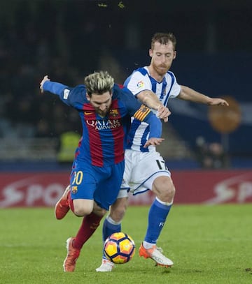 Messi picked himself up after this clash, grimacing and holding his knee.