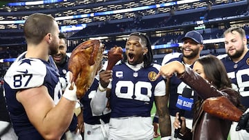 Nov 27, 2025; Arlington, Texas, USA; Dallas Cowboys tight end Jake Ferguson (87) and Dallas Cowboys wide receiver CeeDee Lamb (88) celebrate with a turkey after the game against the Kansas City Chiefs at AT&T Stadium. Mandatory Credit: Kevin Jairaj-Imagn Images TPX IMAGES OF THE DAY