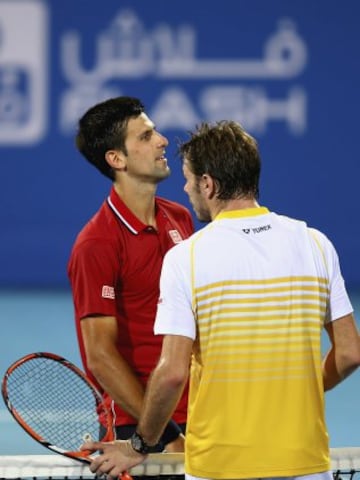 ABU DHABI, UNITED ARAB EMIRATES - JANUARY 02:  Novak Djokovic of Serbia is congratulated by  Stanislas Wawrinka of Switzerland after winning their semi final match during the Mubadala World Tennis Championship at Zayed Sport City  on January 2, 2015 in Abu Dhabi, United Arab Emirates.  (Photo by Francois Nel/Getty Images)