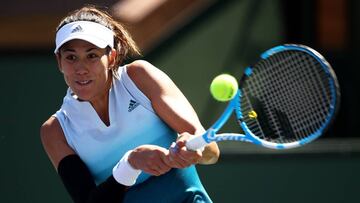 INDIAN WELLS, CALIFORNIA - MARCH 12: Garbine Muguruza of Spain plays a backhand against Kiki Bertens of the Netherlands during their women's singles fourth round match on day nine of the BNP Paribas Open at the Indian Wells Tennis Garden on March 12, 2019 in Indian Wells, California. Clive Brunskill/Getty Images/AFP
== FOR NEWSPAPERS, INTERNET, TELCOS & TELEVISION USE ONLY ==