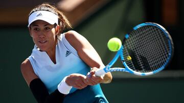 INDIAN WELLS, CALIFORNIA - MARCH 12: Garbine Muguruza of Spain plays a backhand against Kiki Bertens of the Netherlands during their women&#039;s singles fourth round match on day nine of the BNP Paribas Open at the Indian Wells Tennis Garden on March 12, 2019 in Indian Wells, California.   Clive Brunskill/Getty Images/AFP
 == FOR NEWSPAPERS, INTERNET, TELCOS &amp; TELEVISION USE ONLY ==