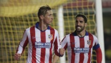 Fernando Torres con Ra&uacute;l Garc&iacute;a.