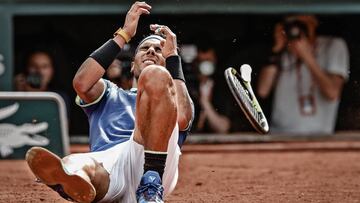 PARIS, FRANCE - JUNE 11: Rafael Nadal of Spain falls backwards after victory during his match against Stan Wawrinka of Switzerland during the Men's Singles Final, on day fifthteen at Roland Garros on June 11, 2017 in Paris, France. (Photo by Ian MacNicol/Getty Images)