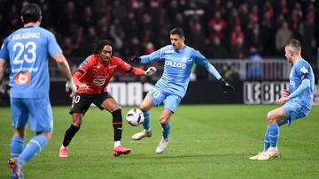 70 Alexis Alejandro SANCHEZ (om) - 90 Djed SPENCE (srfc) during the Ligue 1 Uber Eats match between Rennes and Marseille at Roazhon Park on March 5, 2023 in Rennes, France. (Photo by Anthony Bibard/FEP/Icon Sport via Getty Images)