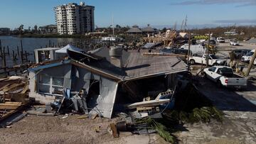 Extreme conditions have battered the east coast and meteorologists warn that the damage will continue, despite Ian being downgraded to a tropical storm.