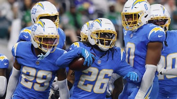 INGLEWOOD, CALIFORNIA - DECEMBER 08: Donte Jackson #26 of the Los Angeles Chargers celebrates a second quarter interception during a game against the Philadelphia Eagles at SoFi Stadium on December 08, 2025 in Inglewood, California. Katelyn Mulcahy/Getty Images/AFP (Photo by Katelyn Mulcahy / GETTY IMAGES NORTH AMERICA / Getty Images via AFP)