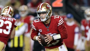 SANTA CLARA, CALIFORNIA - JANUARY 28: Brock Purdy #13 of the San Francisco 49ers looks to throw the ball during the fourth quarter against the Detroit Lions in the NFC Championship Game at Levi's Stadium on January 28, 2024 in Santa Clara, California.   Ezra Shaw/Getty Images/AFP (Photo by EZRA SHAW / GETTY IMAGES NORTH AMERICA / Getty Images via AFP)