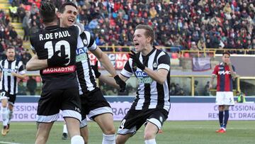 Udinese's Kevin Lasagna, second left, celebrates after scoring during the Italian serie A soccer match between Bologna and Udinese at the Dall'Ara stadium in Bologna, Italy, Saturday, Dec. 30, 2017. (Giorgio Benvenuti/ANSA via AP)