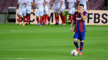 Barcelona's Argentine forward Lionel Messi gestures during the Spanish League football match between FC Barcelona and Sevilla FC at the Camp Nou stadium in Barcelona on October 4, 2020. (Photo by LLUIS GENE / AFP)