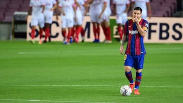 Barcelona&#039;s Argentine forward Lionel Messi gestures during the Spanish League football match between FC Barcelona and Sevilla FC at the Camp Nou stadium in Barcelona on October 4, 2020. (Photo by LLUIS GENE / AFP)