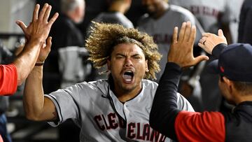 Cleveland Guardians right fielder Josh Naylor celebrates in the dugout after hitting a three run home run against the Chicago White Sox during the eleventh inning at Guaranteed Rate Field.