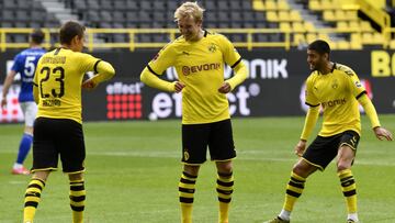 Dortmund (Germany), 16/05/2020.- Dortmund's Thorgan Hazard (L) celebrates with Julian Brandt after scoring the 3-0 lead during the German Bundesliga soccer match between Borussia Dortmund and Schalke 04 in Dortmund, Germany, 16 May 2020. The German B