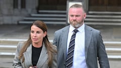 LONDON, ENGLAND - MAY 16: Coleen Rooney and Wayne Rooney depart the Royal Courts of Justice, Strand on May 16, 2022 in London, England. Coleen Rooney, wife of Derby County manager Wayne Rooney, and Rebekah Vardy, wife of Leicester City striker Jamie Vardy, are locked in a libel battle dubbed by the media as the "Wagatha Christie" trial. The case centres around accusations that Mrs Vardy leaked false stories about Mrs Rooney's private life to the press. (Photo by Karwai Tang/WireImage)