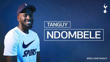 Tanguy Ndombele signs for Tottenham.