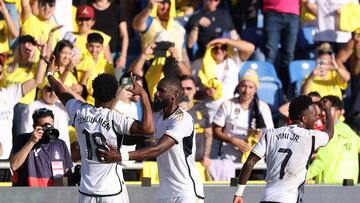 Real Madrid's French defender #18 Aurelien Tchouameni celebrates with Real Madrid's German defender #22 Antonio Rudiger after scoring his team's second goal during the Spanish league football match between UD Las Palmas and Real Madrid CF at the Gran Canaria stadium in Las Palmas de Gran Canaria on January 27, 2024. (Photo by Thomas COEX / AFP)