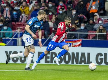 Florian Lejeune y Yannick Carrasco.