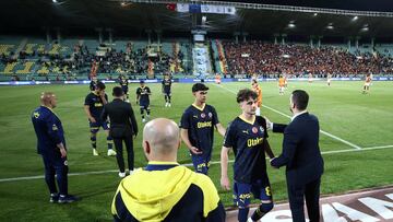 This handout photograph taken and released on April 7, 2024 by Turkish news agency DHA (Demiroren News Agency) shows Fenerbahce's players walking off, leading to the match being abandoned, in Sanliurfa, southeast Turkey. Fenerbahce walked off the field after three minutes of the  rescheduled Turkish Supercup against Galatasaray on April 7 as a protest against alleged unfair treatment. Fenerbahce fielded an Under-19 team for the game against their Istanbul rivals. Galatasaray went ahead after three minutes with a goal from Mauro Icardi. Fenerbahce then walked off, as Turkish media had reported ahead of the game that they planned to kick off and then forfeit the match. (Photo by DHA (Demiroren News Agency) / AFP) / - Turkey OUT / RESTRICTED TO EDITORIAL USE - MANDATORY CREDIT "AFP PHOTO / DHA (Demiroren News Agency)" - NO MARKETING - NO ADVERTISING CAMPAIGNS - DISTRIBUTED AS A SERVICE TO CLIENTS