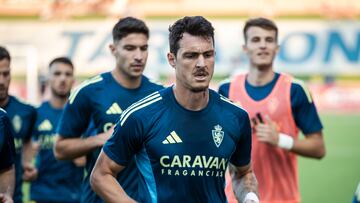 Radovanovic, delante de Tachi y Bazdar.