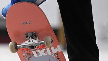 A skateboarder competes in the Men's Quarterfinal of the World Street Skateboarding Rome 2022 event at Colle Oppio park in Rome, on July 1, 2022. (Photo by Tiziana FABI / AFP)