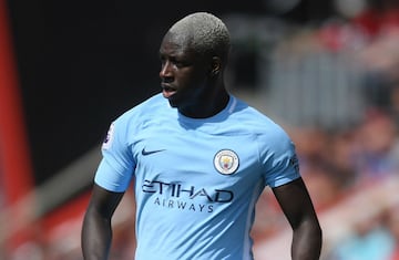 El lateral izquierdo llegó a la English Premier League para la temporada 2017-2018 con la intención de reforzar la zona defensiva del millonario equipo, Manchester City, procedente del Mónaco de la Ligue 1 de Francia por una cantidad de 69.1 millones de dólares. Un año antes, fue una de las grandes revelaciones del campeonato galo en el equipo de Leonardo Jardim, por lo que llamó la atención de los grandes clubes de Europa, pero fue Josep Guardiola quien lo convenció de integrarse a las filas del equipo citizen.