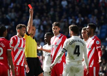Soccer Football - La Liga Santander - Real Madrid v Girona - Santiago Bernabeu, Madrid, Spain - February 17, 2019  Real Madrid's Sergio Ramos is shown a red card by referee Guillermo Cuadra    