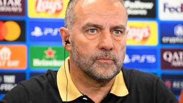 Barcelona's German coach Hans-Dieter Flick gives a press conference on the eve of the UEFA Champions League quarter final first leg football match between Barcelona and Borussia Dortmund at the Joan Gamper training ground in Sant Joan Despi, near Barcelona, on April 8, 2025. (Photo by Josep LAGO / AFP)