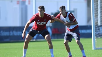 Torró, junto a Aimar, en un entrenamiento anterior.
