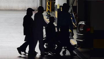 International Olympic Committee (IOC) member Patrick Hickey ((L-R) leaves in wheelchairs the Samaritano Barra Hospital after being arrested on allegations of taking part in a black market ticket ring, on August 18, 2016, in Rio de Janeiro, Brazil. / AFP PHOTO / TASSO MARCELO