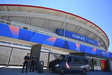 Spanish police officers stand guard outside the Wanda Metropolitan Stadium in Madrid on May 30, 2019 ahead of the UEFA Champions League final football match between Liverpool and Tottenham Hotspur on June 1