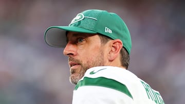 EAST RUTHERFORD, NEW JERSEY - AUGUST 26: Aaron Rodgers #8 of the New York Jets looks on from the sideline during the game against the New York Giants at MetLife Stadium on August 26, 2023 in East Rutherford, New Jersey.   Mike Stobe/Getty Images/AFP (Photo by Mike Stobe / GETTY IMAGES NORTH AMERICA / Getty Images via AFP)