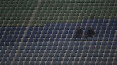 Soccer Football - Egyptian Premier League - Pyramids FC v Zamalek - 30 June Air Defense Stadium, Cairo, Egypt - December 17, 2020 People sit in the stands REUTERS/Amr Abdallah Dalsh