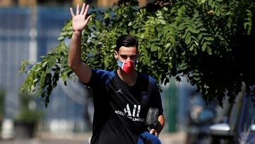 Soccer Football - Paris St Germain Training - Ooredoo Training Centre, Saint-Germain-en-Laye, France - June 25, 2020 Paris St Germain's Sergio Rico is seen wearing a protective face mask while he gestures as he arrives for training following the ou