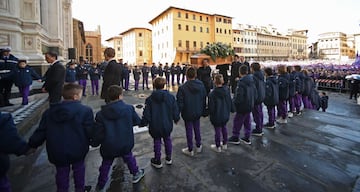 The coffin of Fiorentina's captain Davide Astori is carried inside Santa Croce basilica for the funeral on March 8, 2018 in Florence. Italian player Davide Astori likely died from a cardiac arrest linked to the slowing of his heart rate following the init