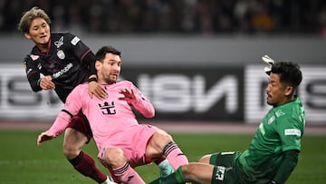 Inter Miami's Argentine forward Lionel Messi (2nd L) clashes with Vissel Kobe's goalkeeper Shota Arai (R) during the second half of the friendly football match between Inter Miami of the US's Major League Soccer league and Vissel Kobe of Japan's J-League at the National Stadium in Tokyo on February 7, 2024. (Photo by Philip FONG / AFP)