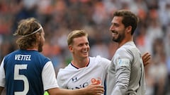 24 August 2022, Hessen, Frankfurt/Main: Sebastian Vettel (l-r), Mick Schumacher and Kevin Trapp stand together at the "Champions for Charity" charity match in honor of Formula 1 legend Michael Schumacher. Photo: Arne Dedert/dpa (Photo by Arne Dedert/picture alliance via Getty Images)