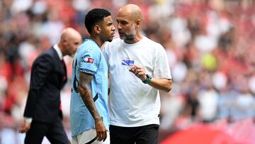 LONDON, ENGLAND - AUGUST 10: Pep Guardiola, Manager of Manchester City gives instructions to Savinho of Manchester City during the 2024 FA Community Shield match between Manchester United and Manchester City at Wembley Stadium on August 10, 2024 in London, England. (Photo by Michael Regan - The FA/The FA via Getty Images)