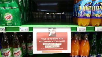 A sign reading "We are no longer selling this brand due to unacceptable price increases. We apologize for the inconvenience caused." is seen on a shelf for PepsiCo product 7up at a Carrefour hypermarket in Paris, France, January 4, 2024.  REUTERS/Stephanie Lecocq