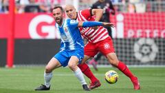 GIRONA, SPAIN - APRIL 01: Sergi Darder of RCD Espanyol battles for possession with Oriol Romeu of Girona FC during the LaLiga Santander match between Girona FC and RCD Espanyol at Montilivi Stadium on April 01, 2023 in Girona, Spain. (Photo by Alex Caparros/Getty Images)
