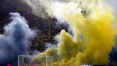 Supporters of Boca Juniors cheer their team before the Argentine Professional Football League match against Arsenal at La Bombonera stadium in Buenos Aires, on June 5, 2022. (Photo by ALEJANDRO PAGNI / AFP)