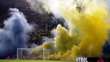 Supporters of Boca Juniors cheer their team before the Argentine Professional Football League match against Arsenal at La Bombonera stadium in Buenos Aires, on June 5, 2022. (Photo by ALEJANDRO PAGNI / AFP)