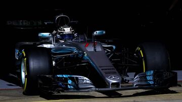 Mercedes driver Valtteri Bottas of Finland leaves the team box during a Formula One pre-season testing session at the Catalunya racetrack in Montmelo, outside Barcelona, Spain, Friday, March 10, 2017. (AP Photo/Francisco Seco)