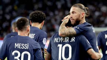 PARIS, FRANCE - AUGUST 13: Neymar Jr of Paris Saint Germain celebrates 2-0 with Sergio Ramos of Paris Saint Germain during the French League 1 match between Paris Saint Germain v Montpellier at the Parc des Princes on August 13, 2022 in Paris France (Photo by Rico Brouwer/Soccrates/Getty Images)