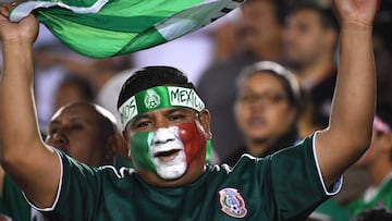 PASADENA, CA - JUNE 15: Fans celebrate a goal by Mexico in the second half of the game against Cuba at the Rose Bowl on June 15, 2019 in Pasadena, California. Jayne Kamin-Oncea/Getty Images/AFP
== FOR NEWSPAPERS, INTERNET, TELCOS & TELEVISION USE O