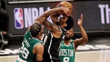 NEW YORK, NEW YORK - MAY 22: Kyrie Irving #11 of the Brooklyn Nets is fouled by Marcus Smart #36 of the Boston Celtics as Kemba Walker #8 of the Boston Celtics defends in the fourth quarter during Game One of their Eastern Conference first-round playoff series on May 22, 2021 at Barclays Center in the Brooklyn borough of New York City. NOTE TO USER: User expressly acknowledges and agrees that, by downloading and or using this photograph, User is consenting to the terms and conditions of the Getty Images License Agreement. Elsa/Getty Images/AFP
== FOR NEWSPAPERS, INTERNET, TELCOS & TELEVISION USE ONLY ==