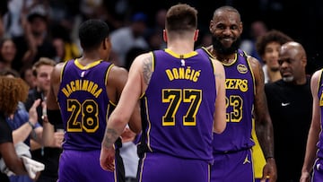 DALLAS, TEXAS - APRIL 09: Luka Doncic #77 embraces LeBron James #23 of the Los Angeles Lakers during the fourth quarter against the Dallas Mavericks at American Airlines Center on April 09, 2025 in Dallas, Texas. NOTE TO USER: User expressly acknowledges and agrees that, by downloading and or using this photograph, user is consenting to the terms and conditions of the Getty Images License Agreement. Sam Hodde/Getty Images/AFP (Photo by Sam Hodde / GETTY IMAGES NORTH AMERICA / Getty Images via AFP)