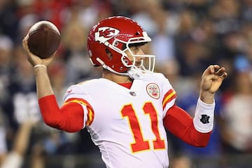 Alex Smith of the Kansas City Chiefs looks to pass during the first half against the New England Patriots