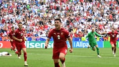 Serbia's forward #08 Luka Jovic (C) celebrates after scoring his team's first goal during the UEFA Euro 2024 Group C football match between Slovenia and Serbia at the Munich Football Arena in Munich on June 20, 2024. (Photo by Miguel MEDINA / AFP)