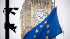 LONDON, ENGLAND - JANUARY 25: An EU flag is seen flying in front of Elizabeth Tower, commonly referred to as Big Ben, as protestors campaign against the ongoing impacts of Brexit on January 25, 2023 in London, England. (Photo by Leon Neal/Getty Images)