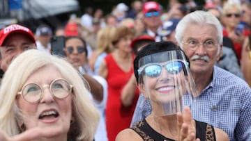 Supporters of Donald Trump listen as he promotes his support for the state of Florida during a campaign stop at Jupiter Inlet Lighthouse and Museum in Jupiter, Florida.